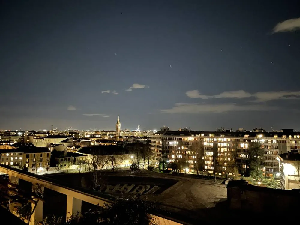 Milan skyline at night from the rooftop